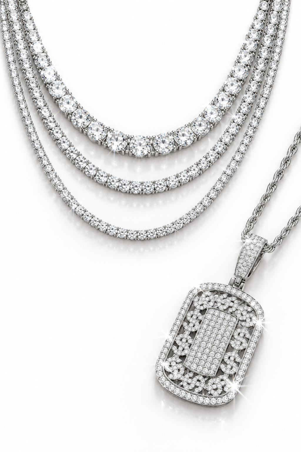 Silver-tone stone-set necklaces and a statement pendant on a clean white background